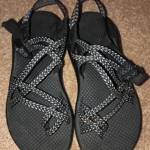 Black and white strapped chacos